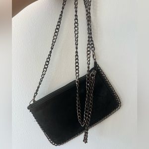 Genuine leather black metallic color bag with chains